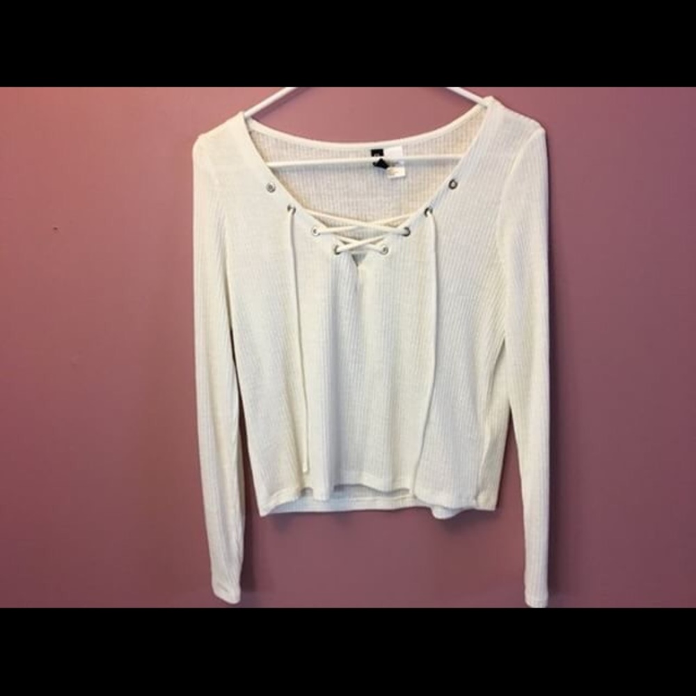 Cross string top